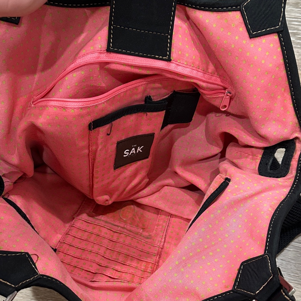 The SAK Chic Black Tote Bag with Pink and Lime Green Polka Dot Interior - Picture 5 of 16